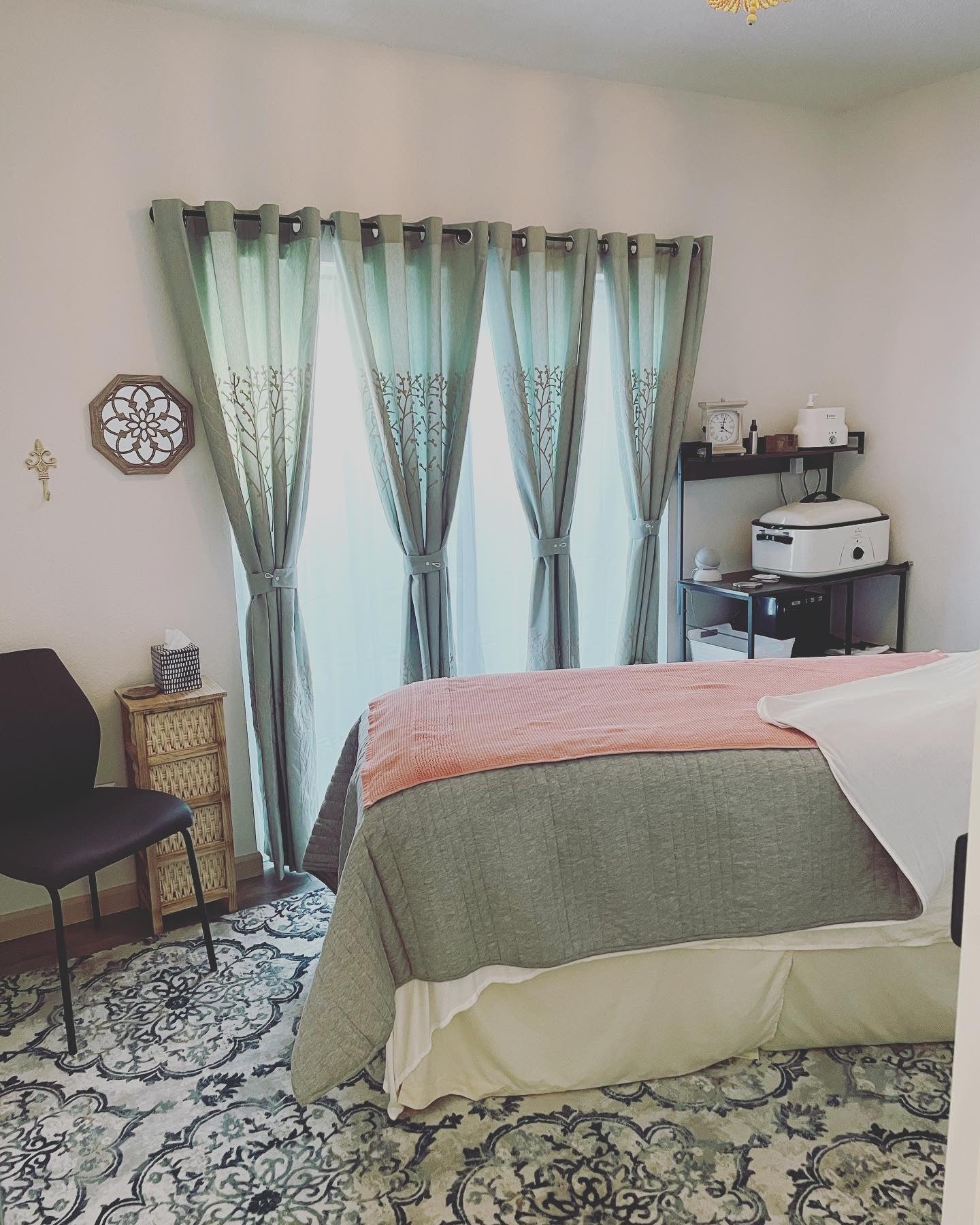 Celtic Clan Health Massage room with table and spring color decor