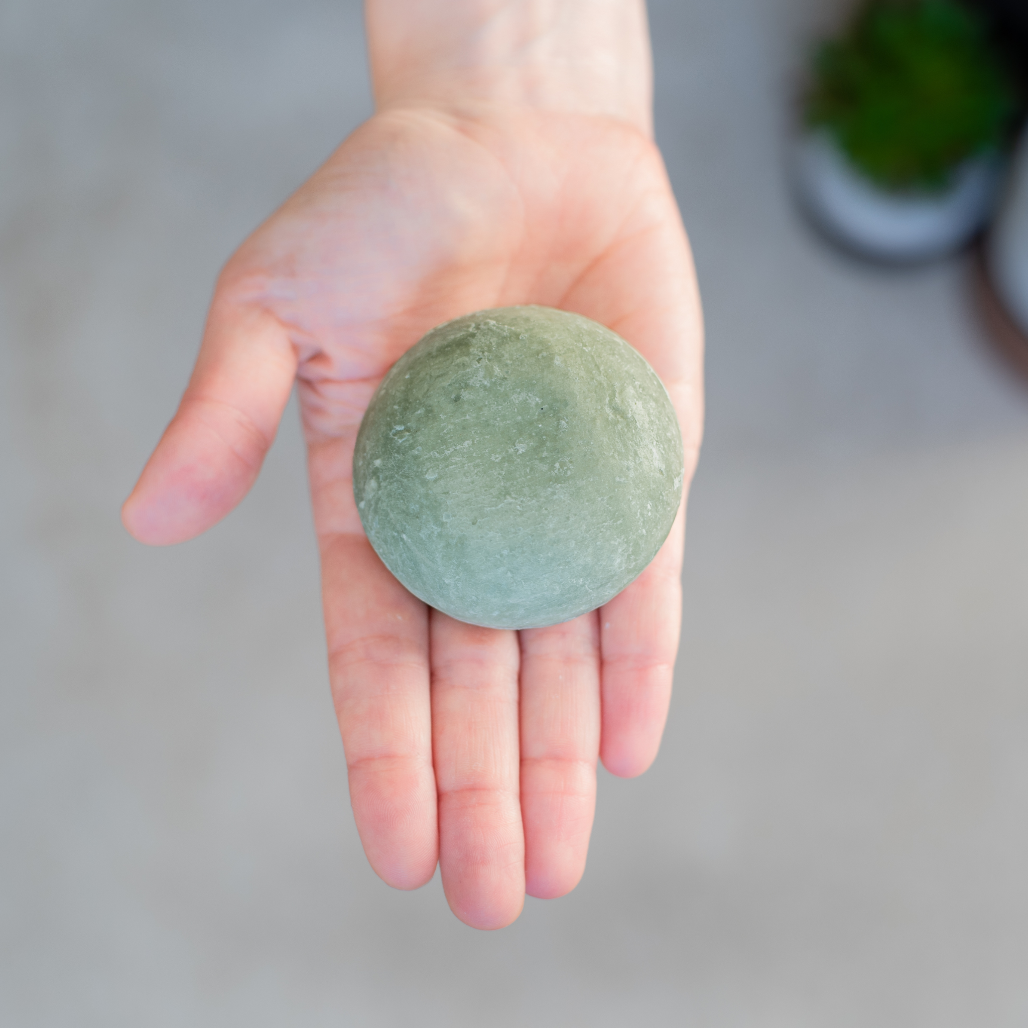 Celtic Clan Soapery sulfate free shampoo bar peppermint essential oil on a hand